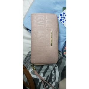 Light pink Steve madden wristlet.